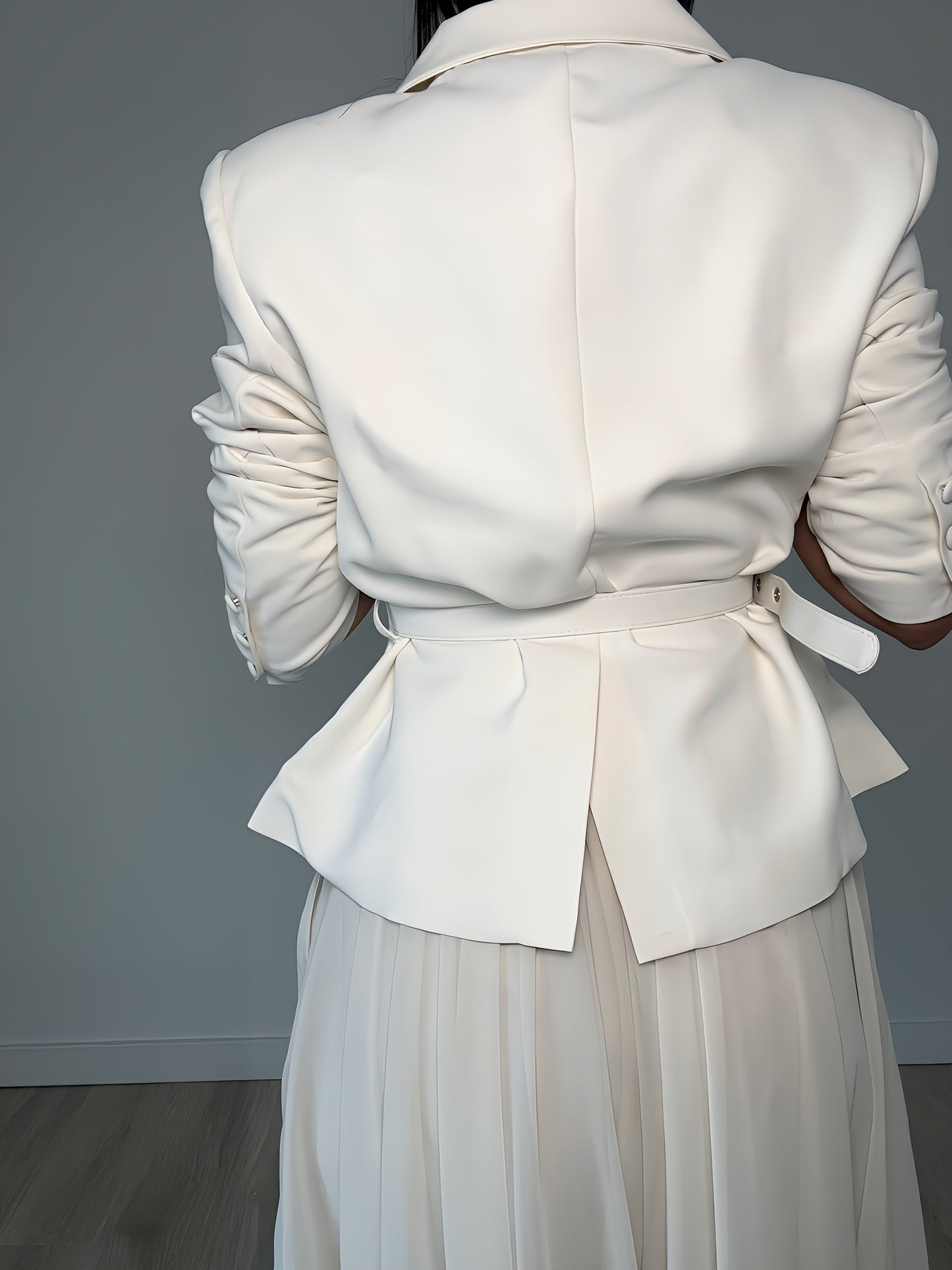 Off-white blazer with high waisted belt