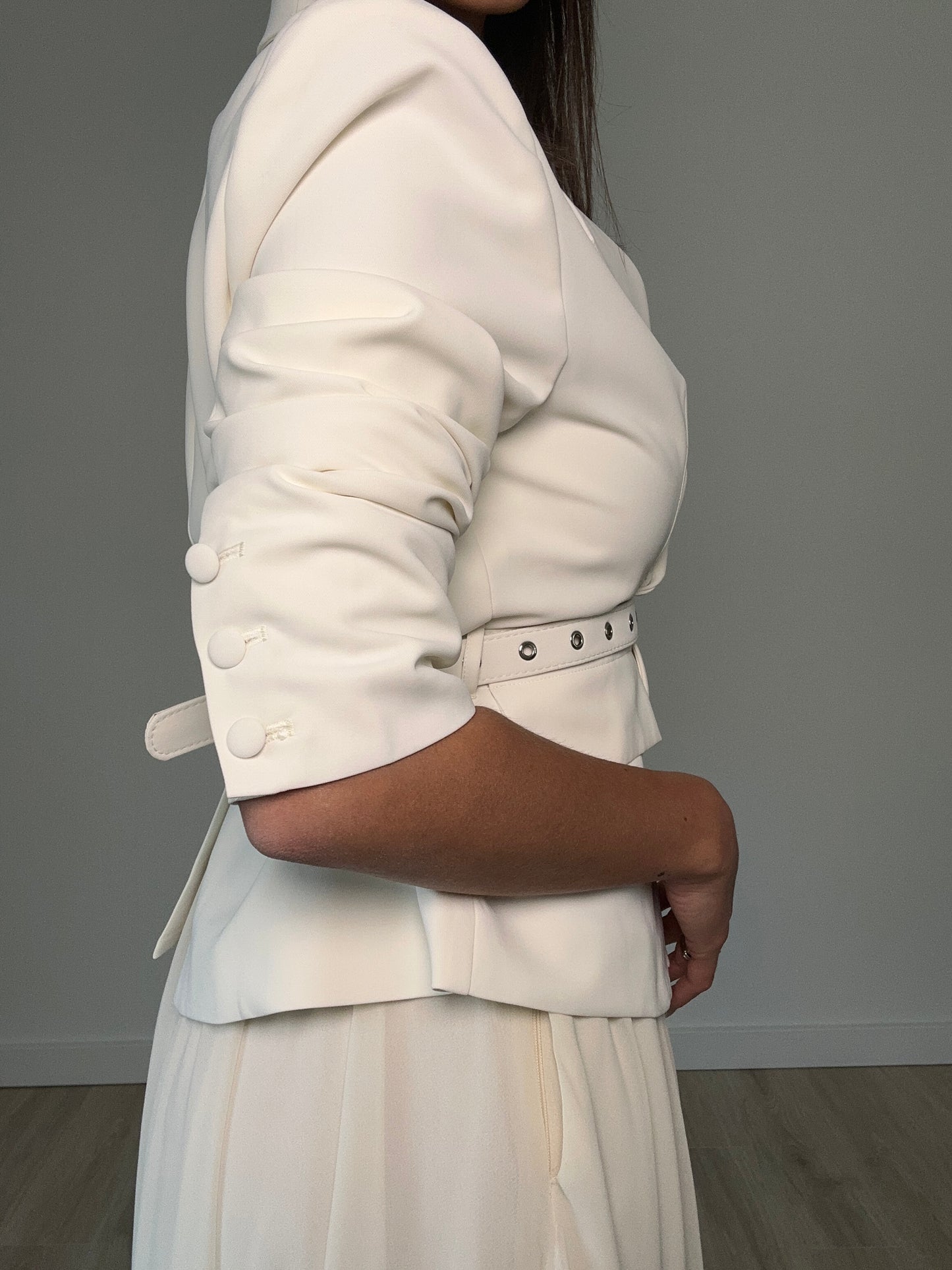 Off-white blazer with high waisted belt